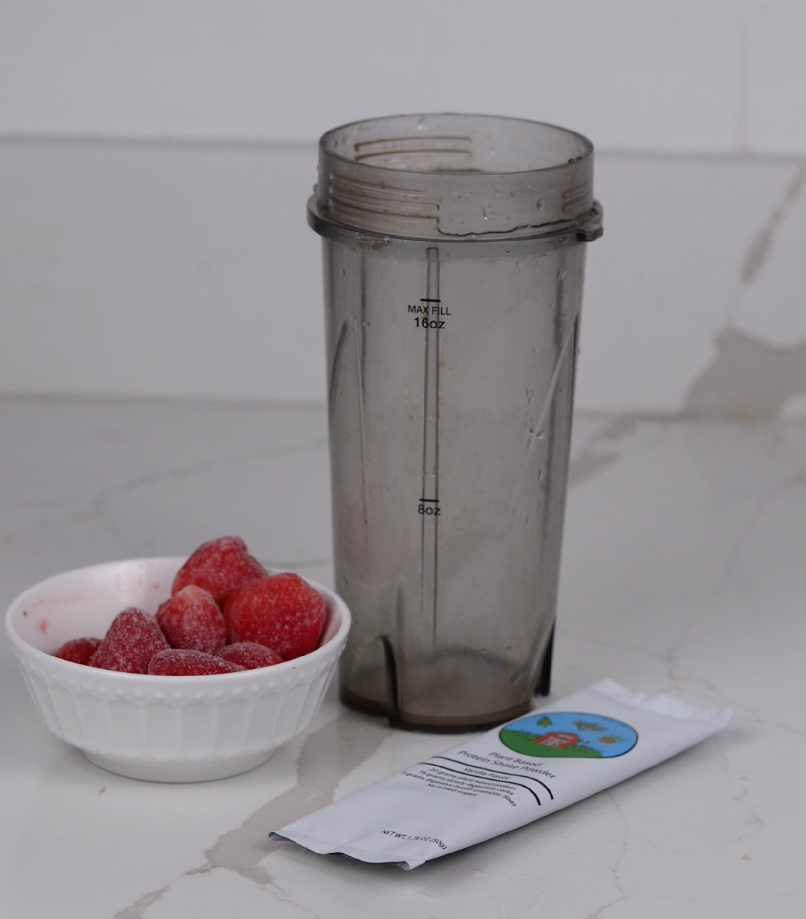Sustain Well Foods Vanilla Drink Mix single pouch on kitchen counter