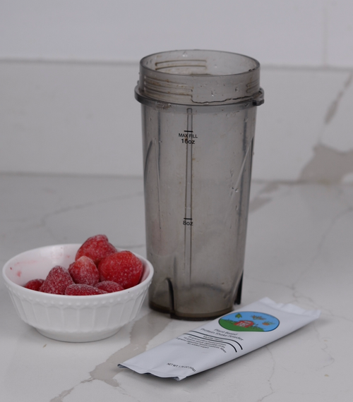 Sustain Well Foods Vanilla Drink Mix single pouch on kitchen counter